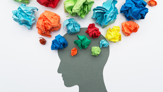 colorful crumpled paper in the shape of a human head on a white background cogwerkz gadgets brain teaser puzzles physics toys